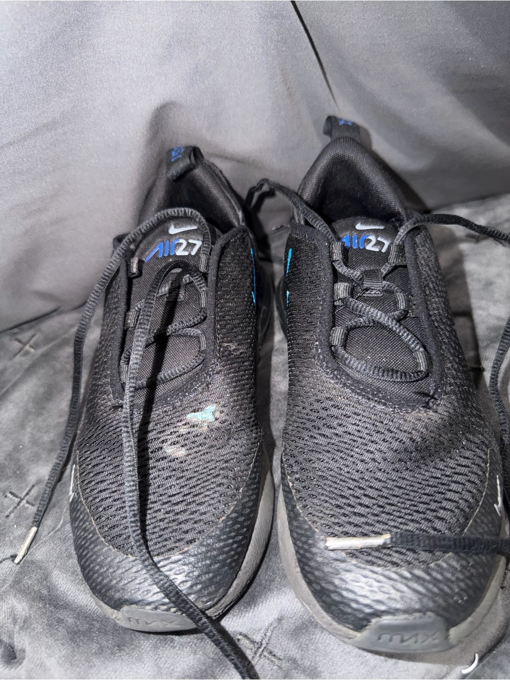 Nike Black Athletic Sneakers with Blue Accents